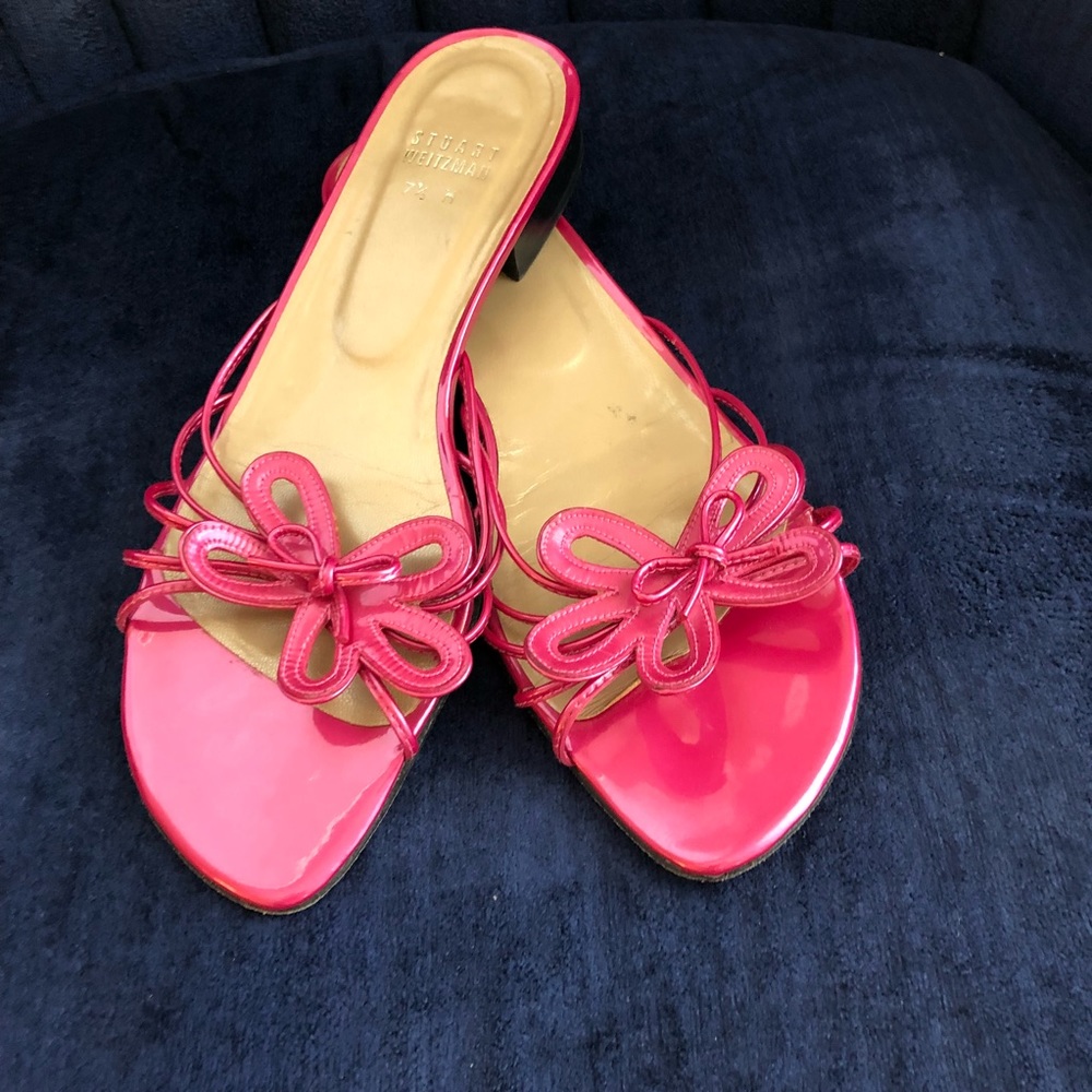 Pink patent leather Stuart Weitzman sandals.